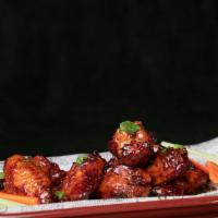 Crispy Fried Wings · Choice of sauces: Bourbon BBQ, buffalo, garlic parmesan, jamaican jerk. Served with ranch or...