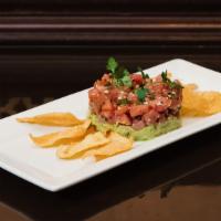 Tuna Tartare · With avocado mousse and wonton chips.