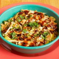 Asian Rice Bowl · Kahuna rice, mushrooms, onion, carrots, edamame, cabbage, Korean BBQ sauce, sesame slaw, sca...