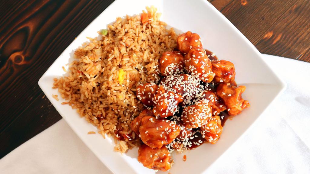 Sesame Chicken · Spicy. A chunk of white meat chicken sautéed with sesame sauce. Hot and spicy. Served with white rice.