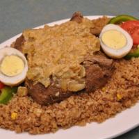 Yassa Chicken · Halal. Chicken marinated overnight in lemon and secret spices, cooked with onions, tomatoes,...