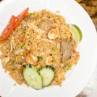 House Fried Rice · With chicken, beef and shrimp.
