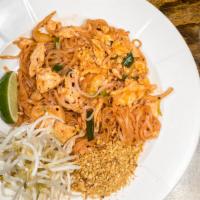 Pad Thai · Thai rice noodle pan-fried with egg and onion. Topped with peanuts and bean sprouts.