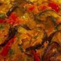 Spicy Eggplant Curry · Pecies of Chinese eggplant cooked with fresh tomatos, green chillies and spices.