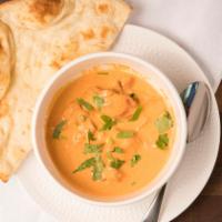 Butter Chicken · This North India dish made with boneless chicken, mildly spiced tomato sauce and cream. This...