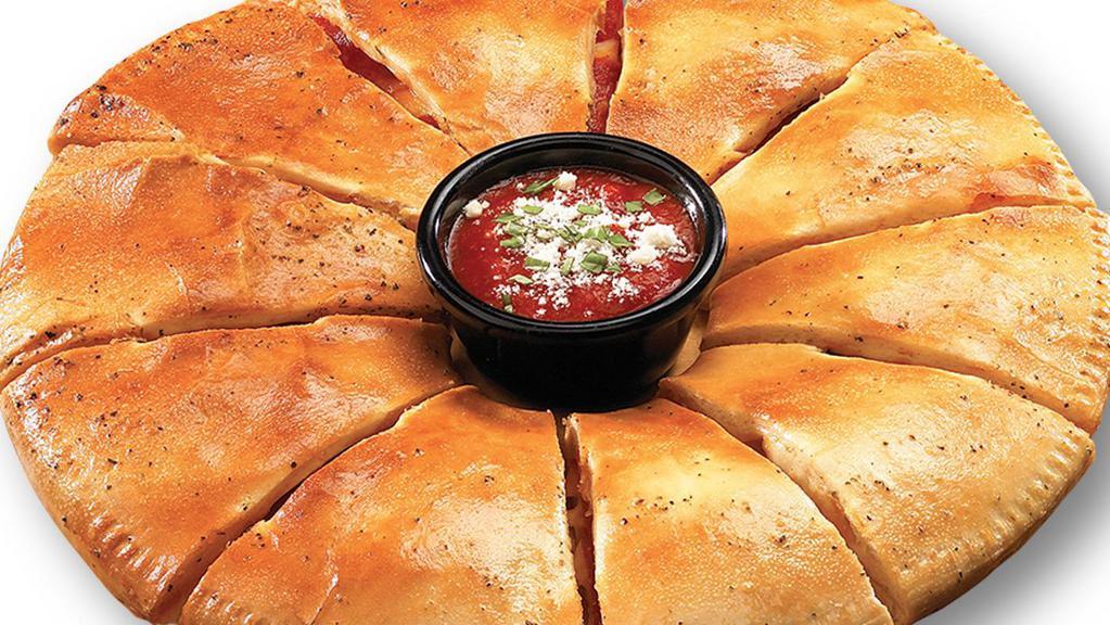 4 Meat - 4 Cheese Calzone · Our Signature Calzone Ring® stuffed with Four Meats and Four Cheeses. Brushed with Garlic Butter and Garlic Parmesan. Served with Marinara or our Famous Ranch Dressing.