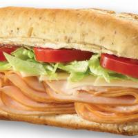 Turkey & Provolone · Sliced, tender turkey breast with red onions, provolone cheese, lettuce and tomato; served w...