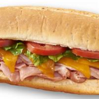 Ham & Cheddar · Shaved ham, melted cheddar cheese, lettuce and tomato with our creamy Italian dressing.