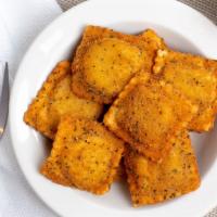 Toasted Ravioli (10 Pieces) · Toasted Ravioli filled with a delicious sausage and cheese combination. Served with your cho...