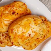 Garlic Cheese Toast (4 Slices) · Italian bread brushed with garlic butter, topped with four-cheese blend and toasted golden b...
