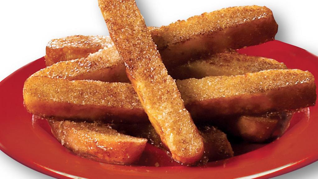 Cinnamon Sticks · Small deep pan dough, cut into strips, basted with a cinnamon/sugar/margarine mix and lightly cooked until soft and gooey. Served with vanilla icing.