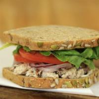 Louisville Chicken Salad · Chunks of white chicken and spiced pecans in a seasoned mayonnaise, topped with fresh tomato...