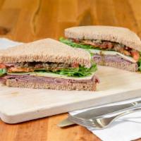 Pepper Blue Roast Beef · Hearty roast beef topped with tomatoes, pepper, special blue cheese spread, and leafy green ...