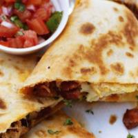 Chorizo And Potato Quesadilla · Chorizo, potatoes, and shredded melted cheese in a crispy flour tortilla and served with a s...