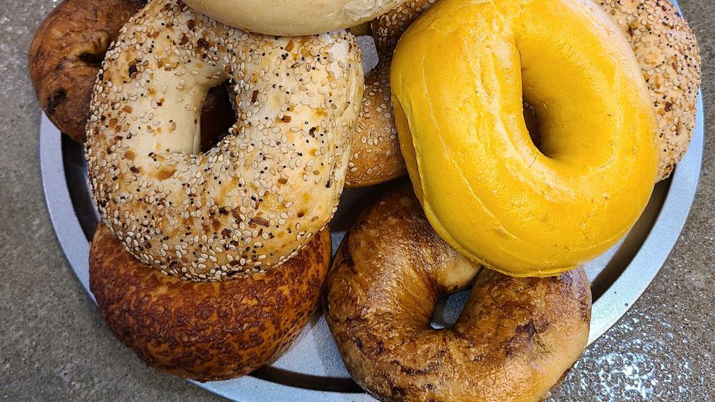 Dozen Bagels & 2 Spreads · 13 of our freshly baked New York Style water bagels! With 2 1/2lb (8oz) spreads of your choice!