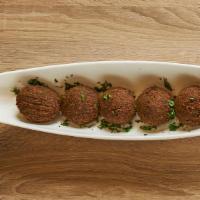 Falafel (6 Pieces) * · No gluten and Vegetarian. One of our best items. Falafel is a deep-fried ball made from grou...