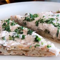 Tartufo* · Home-made wild mushroom and truffle oil spread on lightly toasted ciabatta bread.

Cooked to...