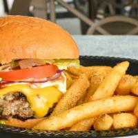 Oleta Angus Burger · All Angus beef patty topped with American cheese, lettuce, tomato, and onions on a brioche b...