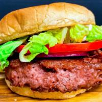 Classic V Burger · Plant based burger, lettuce, onion, tomato, vegan cheese, vegan mayo, and on a toasted bun.