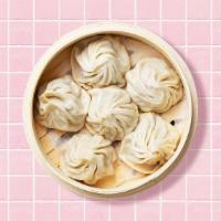 Shrimp Soup Dumplings · Six shrimp soup dumplings with dipping sauce.