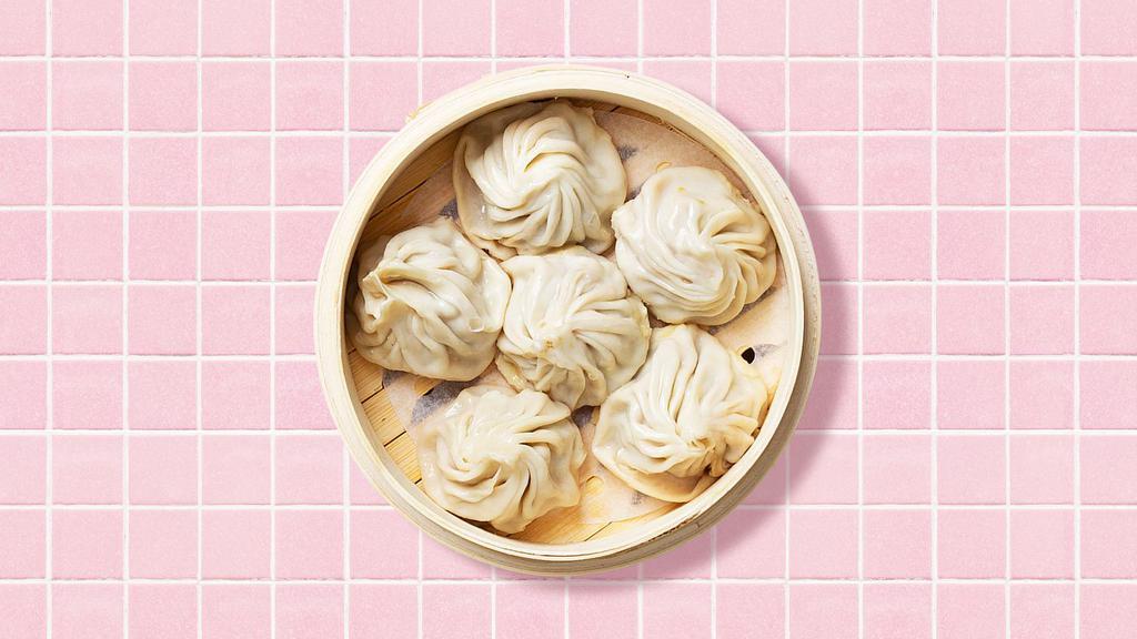 Shrimp Soup Dumplings · Six shrimp soup dumplings with dipping sauce.