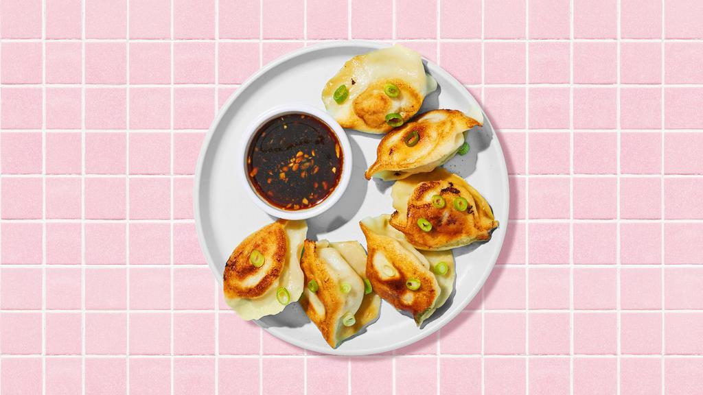 Fried Shrimp Dumplings · Six fried shrimp dumplings with dipping sauce.