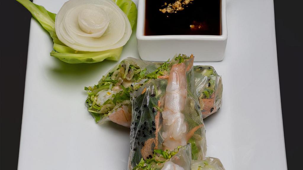 Summer Roll · *Vegan option available* Refreshingly crisp lettuce bowls filled with sizzling chicken, prawns, carrots, celery, water chestnuts, onions, and crunchy noodles. Served with our special hoisin sauce.