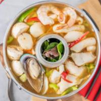 Seafood Hot Pot · Creation and explosion of flavor, Spicy seafood soup. shrimp, squid, fish, scallops, lemongr...