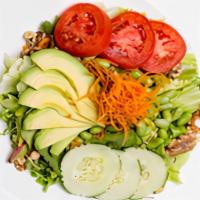 Happy Salad · A happy blend of tomatoes, cucumbers, organic edamame, avocado, fried red onions, carrots, a...