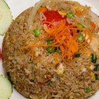 Siamese Fried Rice · Stir fried with eggs, peas, tomatoes, onions, carrots, and scallions