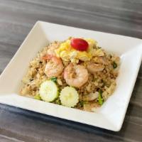 Special Fried Rice · Fried rice, prepared in Thai wok, with chicken, beef, shrimp, egg, tomatoes, scallions, onio...