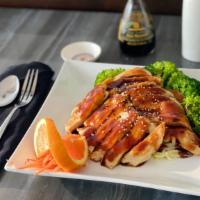 Chicken Teriyaki · Grilled chicken with teriyaki sauce, steamed vegetables and a side of thai jasmine white rice.