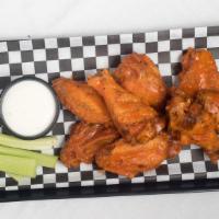 Wings (8) · Fried naked and tossed in a sauce of your choice.