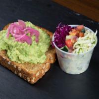 Avocado Toast · Mashed Avocado on delicious whole grain toast with pickled onions.