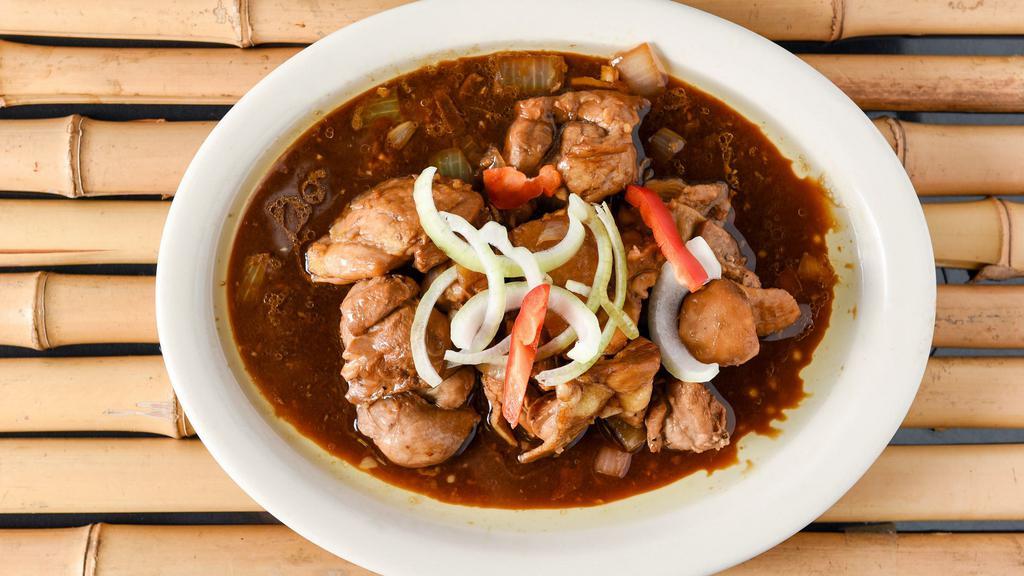 Chicken Adobo · A classic. Chicken marinated in vinegar and soy sauce.
