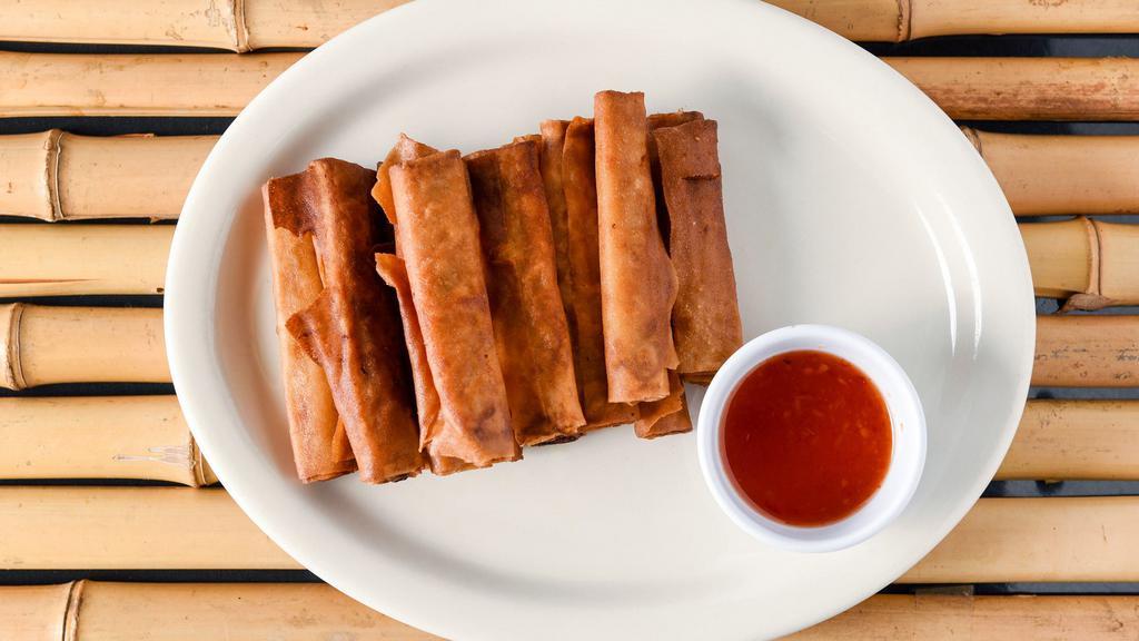 Egg Roll · 12 pieces of fried ground pork rolls with vegetables.