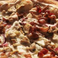 Chicken, Bacon, Ranch Pizza Slice · Diced chicken, crumbled bacon, fresh tomatoes, red onions on a ranch sauce base.