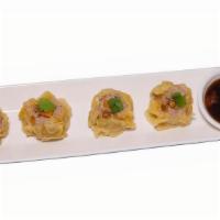 Thai Dumpling · Handmade steamed dumpling with shrimp, chicken, and pork served with sweet chili soy sauce m...