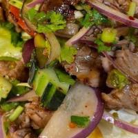 Beef Salad · Sliced grilled flank steak, chili, green onion, cilantro, lime juice, tomatoes, cucumber