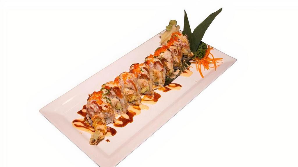 Red Dragon Roll · Shrimp tempura, snow crab meat and avocado topped with spicy tuna mix served with ell and spicy mayo sauce on top. Raw/undercooked.