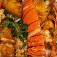 Lobster Fried Rice · Fried rice with lobster meat in brown sauce with onion, scallion , breaded fried lobster and...