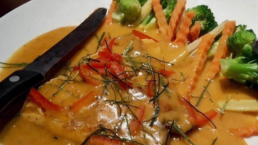 Chu Chee Salmon · Grilled salmon fillet with special curry sauce.