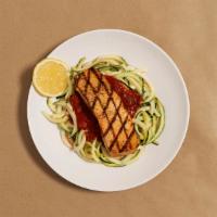 Salmon Vodka Zoodles · Zucchini noodles in a creamy tomato vodka sauce with seasoned salmon and fresh Parmesan chee...