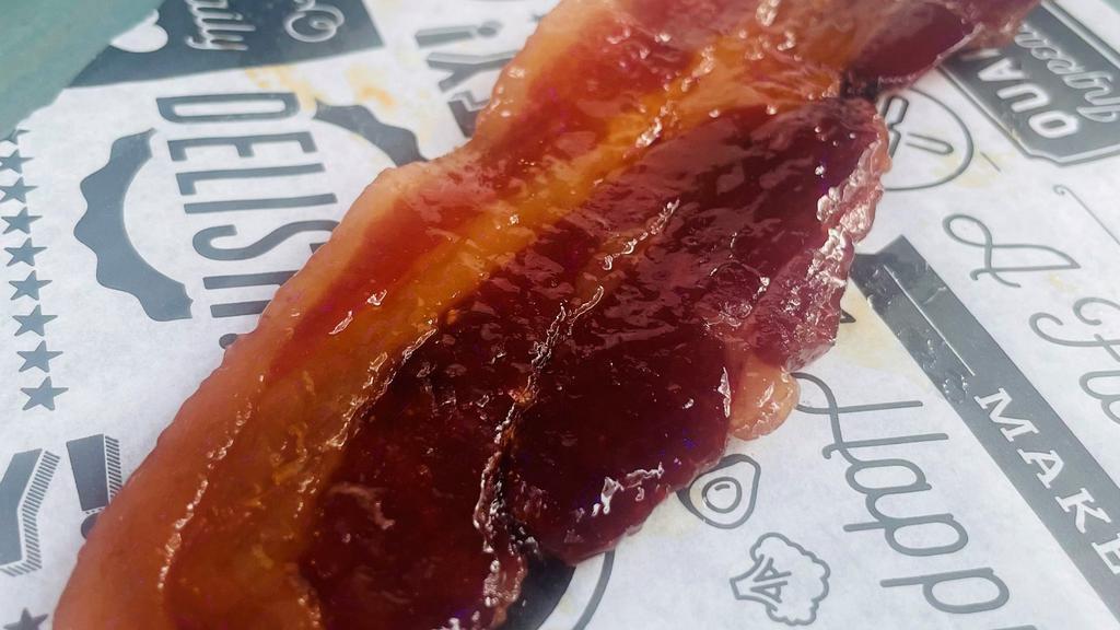 Candied Bacon · Applewood smoked bacon baked with light brown sugar