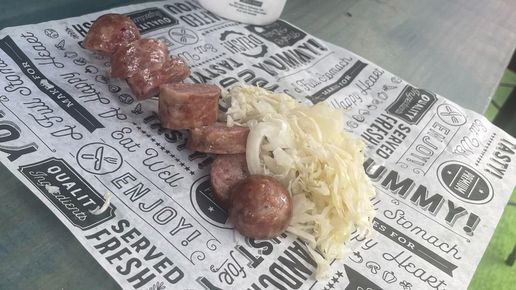 Hand-Crafted Smoked Sausage  · Smoked sausage served with Mocha's homemade sauerkraut 

*add a side of our Spicy Mustard sauce for happy taste buds