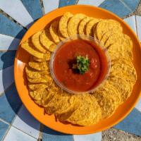 Chips & Salsa · Tomatillo salsa and corn chips