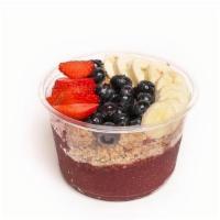 Berry Classic Açaí Bowl · Acai Bowl topped with granola, Banana, Blueberries, and Strawberries