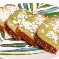 Green Eggs & Guac Toast · Egg Salad folded in guac topped with one boost of your choice. Side of fruit or greens inclu...