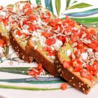 California Toast · Smashed avocado on toasted Whole Wheat Bread topped with Sunflower Seeds, Balsamic Tomatoes,...