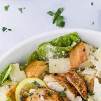 Chicken Or Steak Caesar Salad · Ensalada Cesar de Pollo o carne.